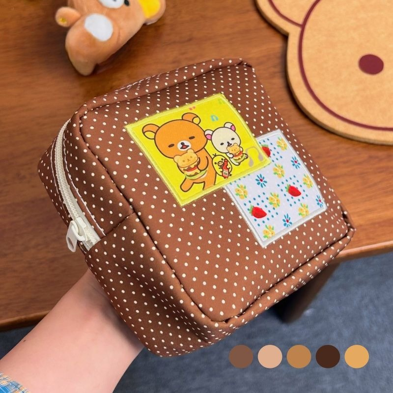 Travel Accessories Must Have - حقيبة مستحضرات تجميل كاواي ريلاكوما بنقاط